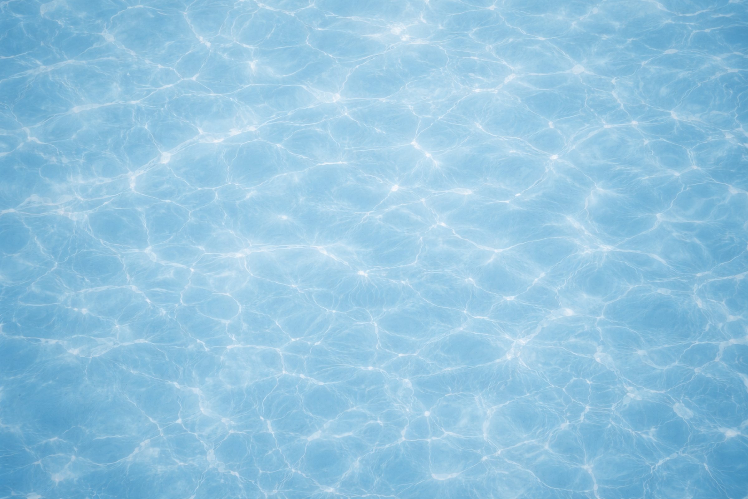 Clear blue pool water texture at a residential pool in Anne Arundel County, Maryland